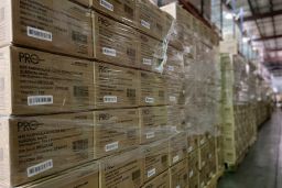 This Friday, Feb. 5, 2021 photo provided by Prestige Ameritech shows boxes of the company's N95 masks in warehouse storage at North Richland Hills, Texas, outside of Fort Worth. (Chris Tarrant/Prestige Ameritech via AP)
