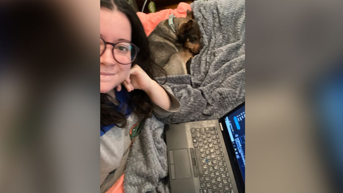 Fort Worth Star-Telegram reporter Nichole Manna (with her dog Ollie) tries to stay warm working from home. She turned her heat down to 65 to answer Texas' call to conserve electricity. Her home is old and quite drafty.