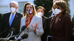 WASHINGTON, DC - FEBRUARY 05: Speaker of the House Nancy Pelosi (D-CA) (2nd L) talks to reporters outside the West Wing after she and House Democratic leaders, including (L-R) Majority Leader Steny Hoyer (D-MD), Rep. Nydia Velazquez (D-NY), Rep. Maxine Waters (D-CA) and others, met with U.S. President Joe Biden to discuss coronavirus relief legislation at the White House February 5, 2021 in Washington, DC.  In an effort to generate bipartisan support for his legislation, Biden met earlier in the week with Republican and Democratic senators to discuss his administration's $1.9 trillion COVID-19 relief plan. (Photo by Chip Somodevilla/Getty Images)