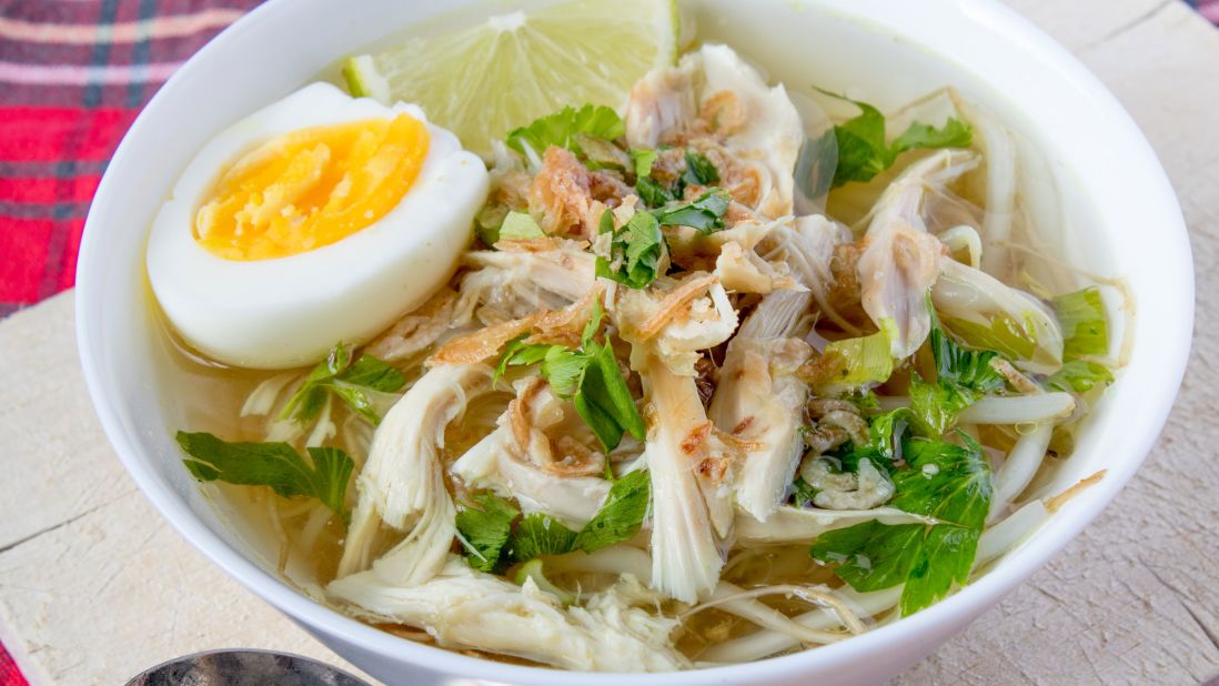 <strong>Soto ayam | Indonesia:</strong> This is chicken noodle soup with an Indonesian twist. Fresh turmeric, star anise, cinnamon, lemongrass and lime leaves combine for deeply layered flavor, with soft-boiled eggs adding extra richness.