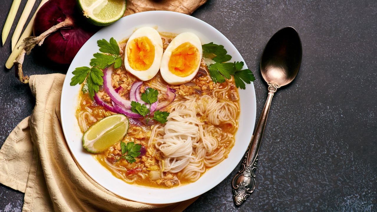 This version of mohinga features catfish, rice noodles, chicken eggs and lime. 