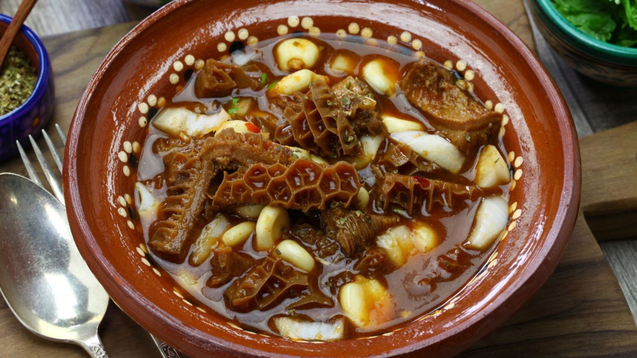<strong>Menudo | Mexico:</strong> This traditional Mexican soup is made with tripe (cow stomach) and hominy in a garlicky broth.