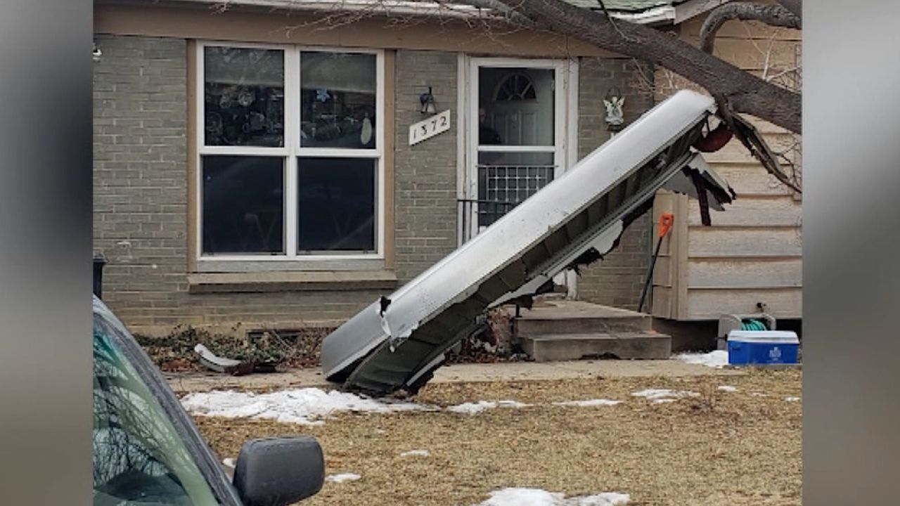 Debris from the aircraft landed outside a home in Broomfield, Colorado, on Saturday.
