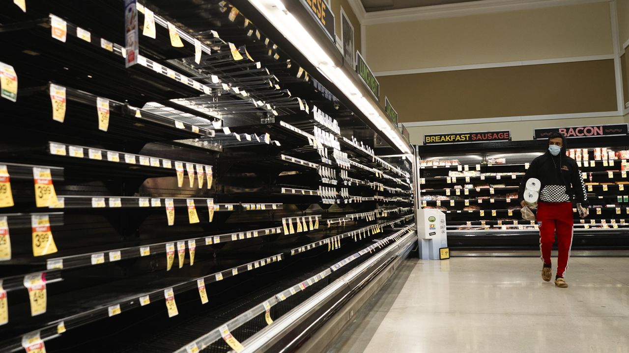 Empty shelves in the meat aisle at a grocery store in McKinney, Texas, on Wednesday