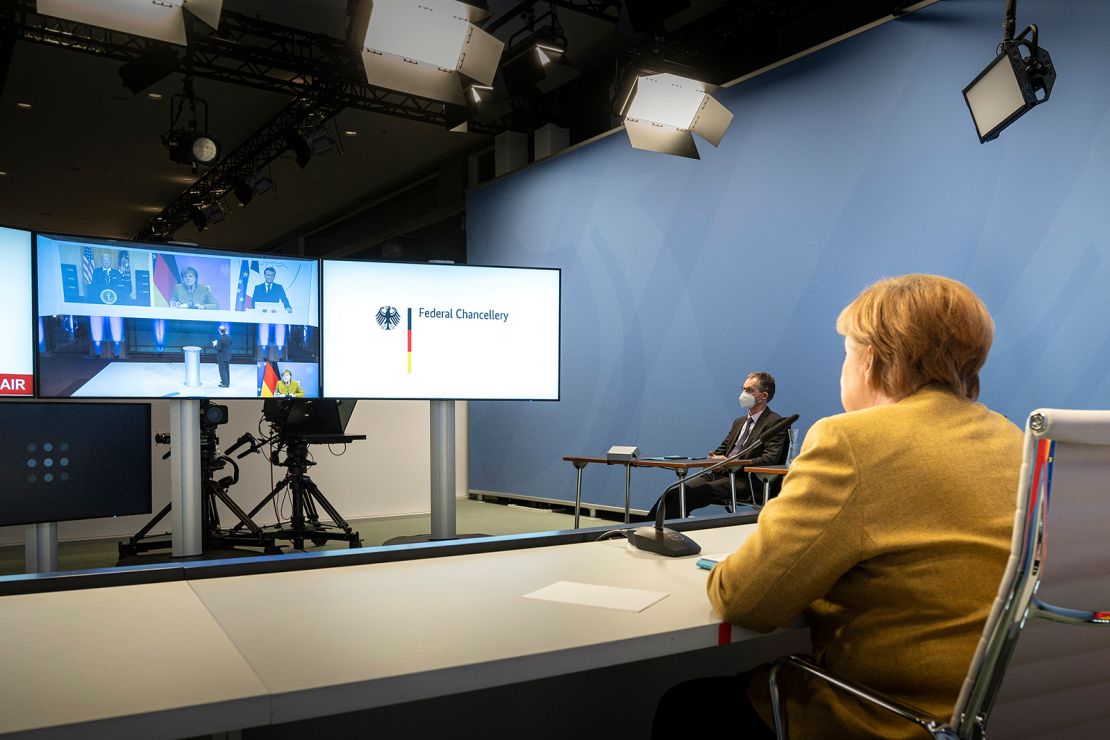 German Chancellor Angela Merkel during Friday's virtual Munich Security Conference with Biden and French President Emmanuel Macron on screen.