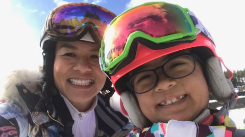 Olivia Nguyen (right), 11, loved skiing with her mom, Jackie Nguyen.