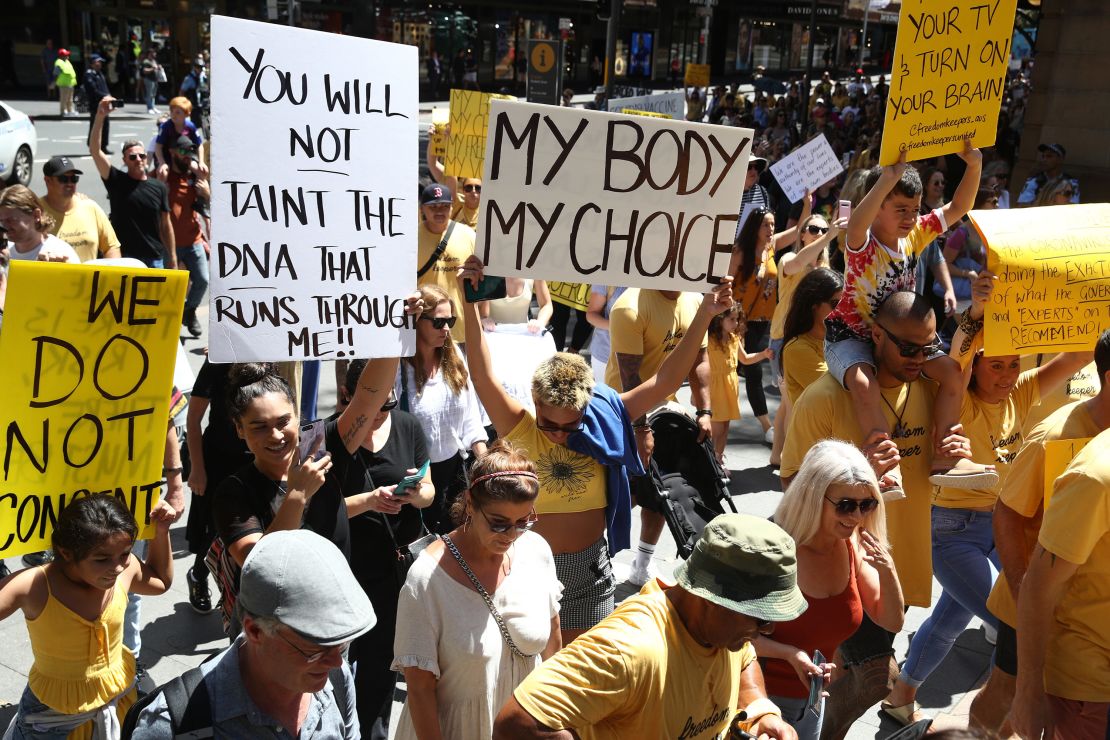 Anti-vaccine protesters march in Sydney, Australia on February 20, 2021.