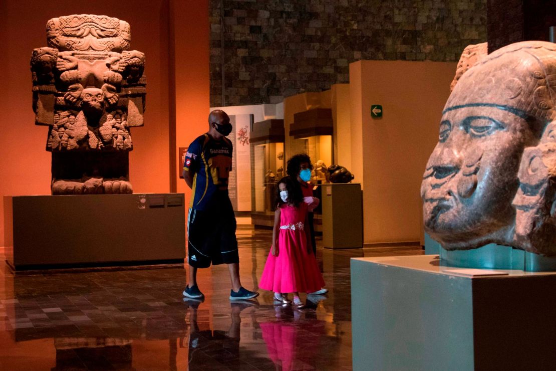 People visit the National Museum of Anthropology in Mexico City on November 14, 2020.