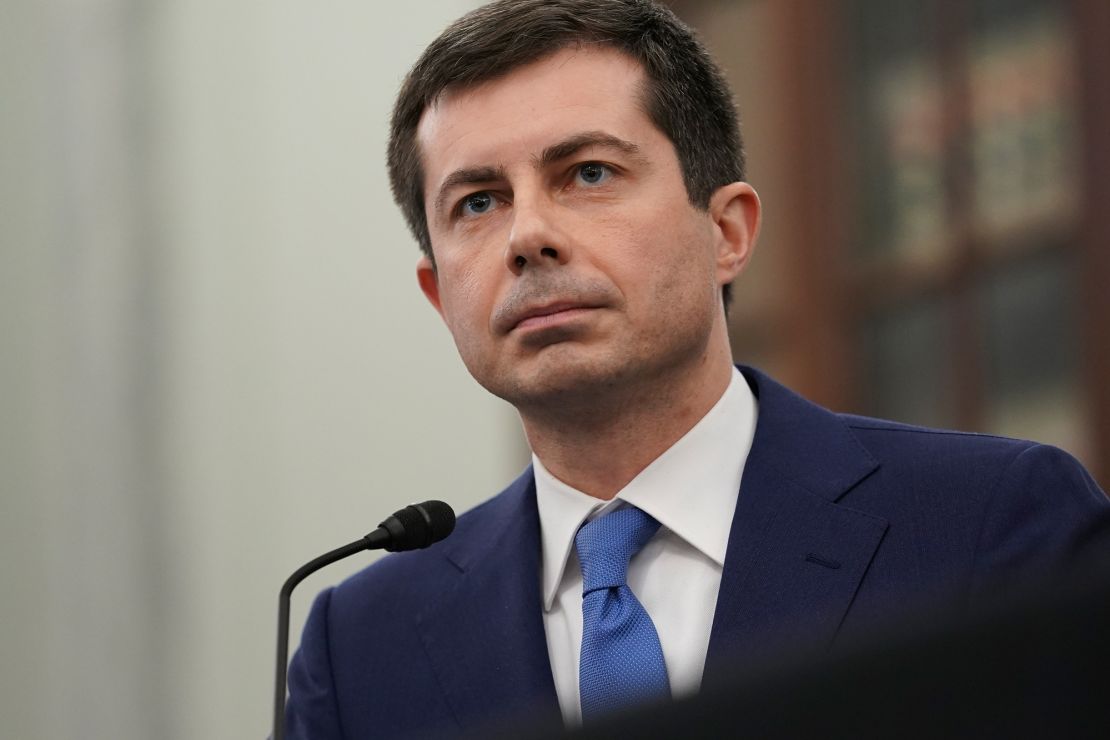 Transportation Secretary Pete Buttigieg listens during his confirmation hearing earlier this year. (Photo by Stefani Reynolds/Getty Images)