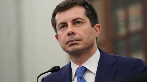 Transportation Secretary Pete Buttigieg listens during his confirmation hearing earlier this year. (Photo by Stefani Reynolds/Getty Images)