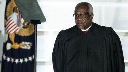Clarence Thomas, associate justice of the U.S. Supreme Court, listens during a ceremony on the South Lawn of the White House in Washington, D.C., U.S., on Monday, Oct. 26, 2020. The Senate voted 52-48 Monday to confirm Amy Coney Barrett to the U.S. Supreme Court, giving the court a 6-3 conservative majority that could determine the future of the Affordable Care Act and abortion rights. Photographer: Al Drago/Bloomberg via Getty Images