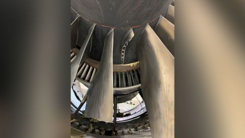The damage to fan blades in the number 2 engine of United Airlines flight 328, a Boeing 777-200, following an engine failure incident on Saturday, February 20, 2021. 