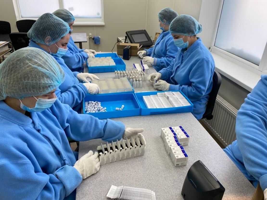 Vials of vaccine are packed at the Generium Pharmaceutical plant, which is gearing up production of Sputnik V.