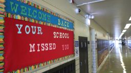 A Welcome Back sign on a bulletin board Thursday, Feb. 11, 2021, greets returning students at Chicago's William H. Brown Elementary School. In-person learning for students in pre-k and cluster programs began Thursday, since the district's agreement with the Chicago Teachers Union was reached. (AP Photo/Shafkat Anowar, Pool)