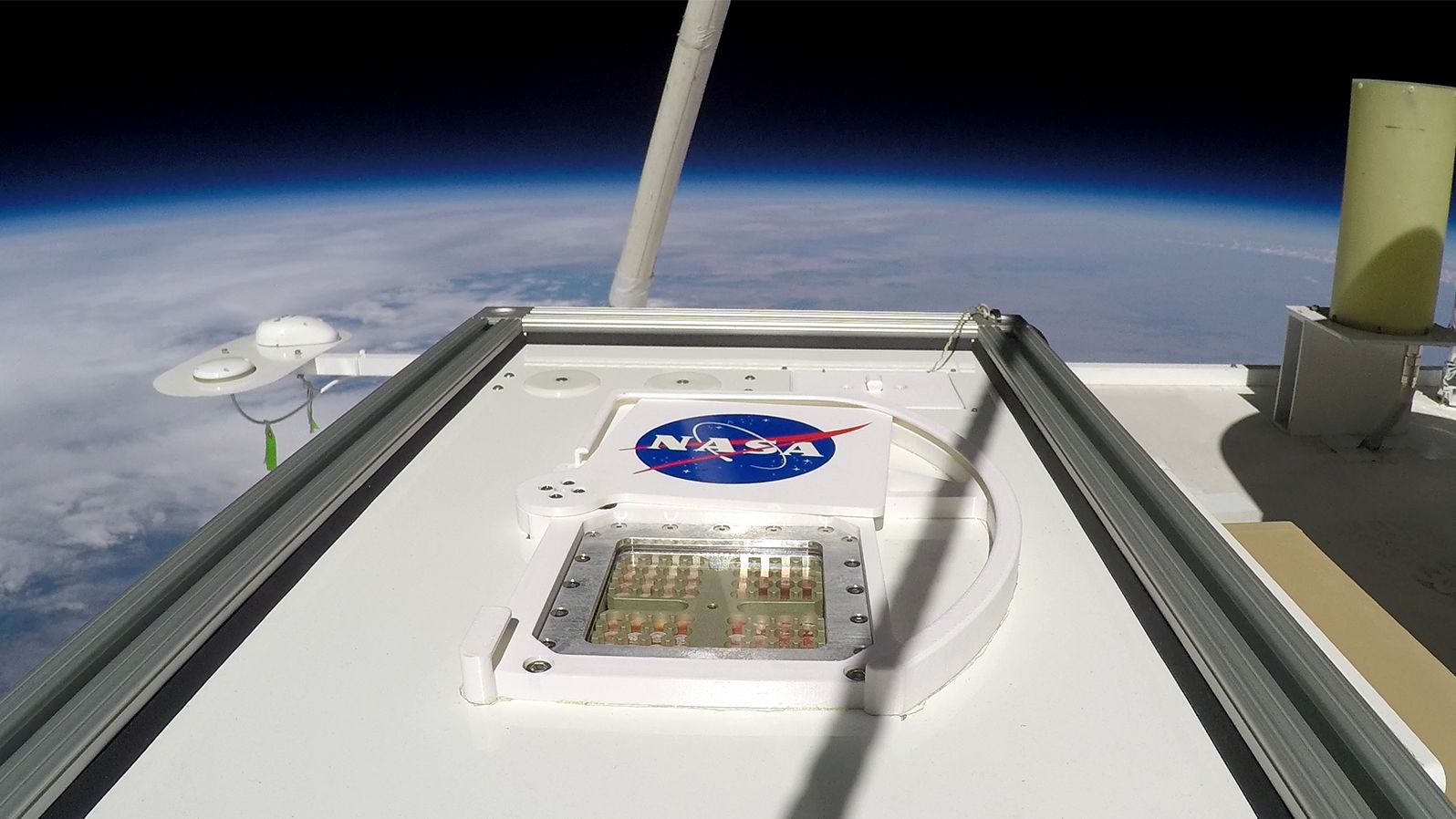The MARSBOx took flight in September 2019. Its door rotated open, exposing samples of four different types of microorganisms to the extreme environmental conditions of the Earth's stratosphere.