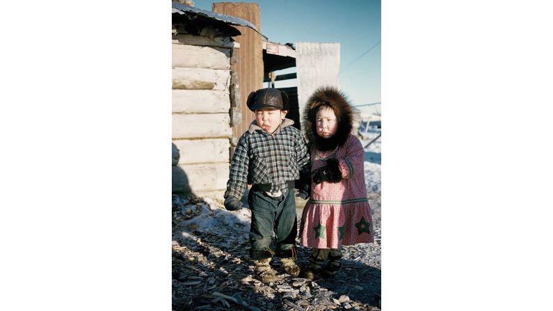 <strong>Recognizing the past: </strong>Walkie Charles, an associate professor of Yup'ik, the language of the Yup'ik people, at the University of Alaska Fairbanks, recognizes himself in this photo, with his sister Mary Keyes.