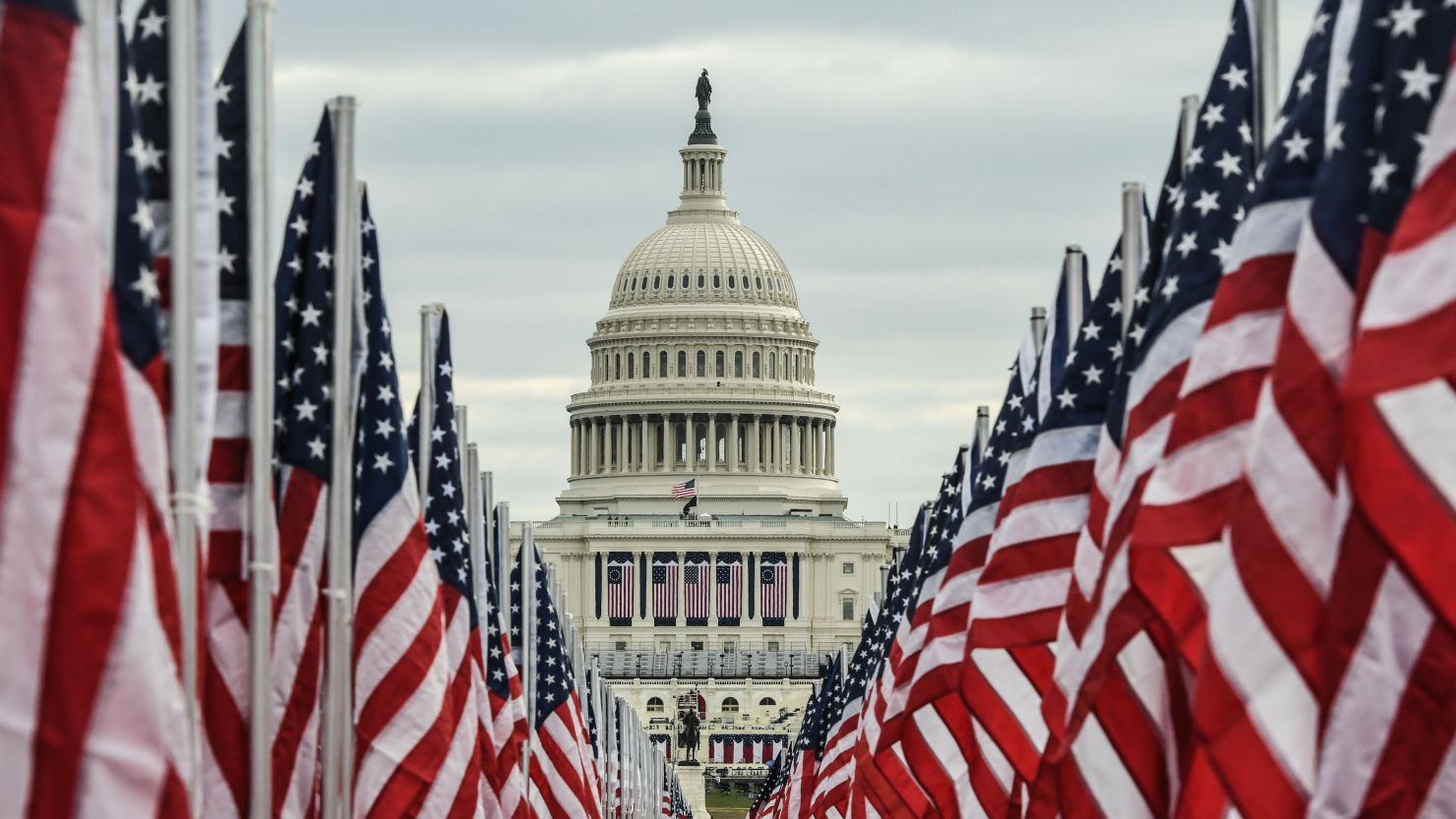 The Capitol building is seen surrounded by American flags on the National Mall on January 19, 2021. 