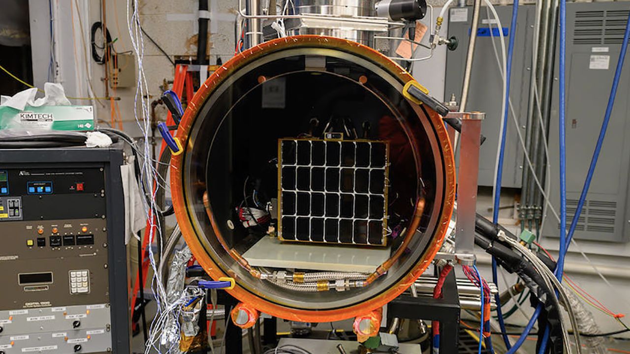 The Photovoltaic Direct Current to Radio Frequency Antenna Module (PRAM) sits inside thermal vacuum chamber during testing at the US Naval Research Laboratory in Washington, DC.