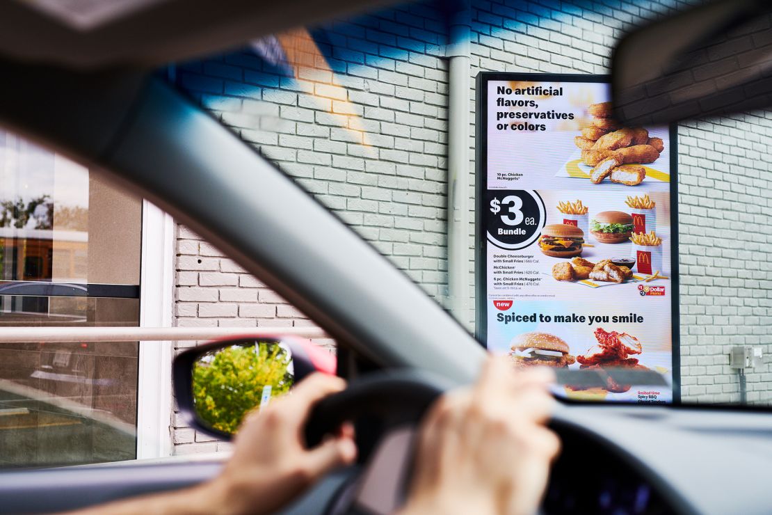 Customers order food at a digital menu board at a McDonald's in Brooklyn, New York.