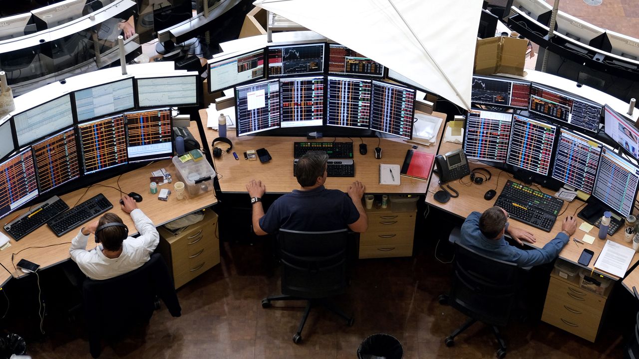 Financial traders monitor data on the trading floor inside the Amsterdam Stock Exchange, operated by Euronext NV. 