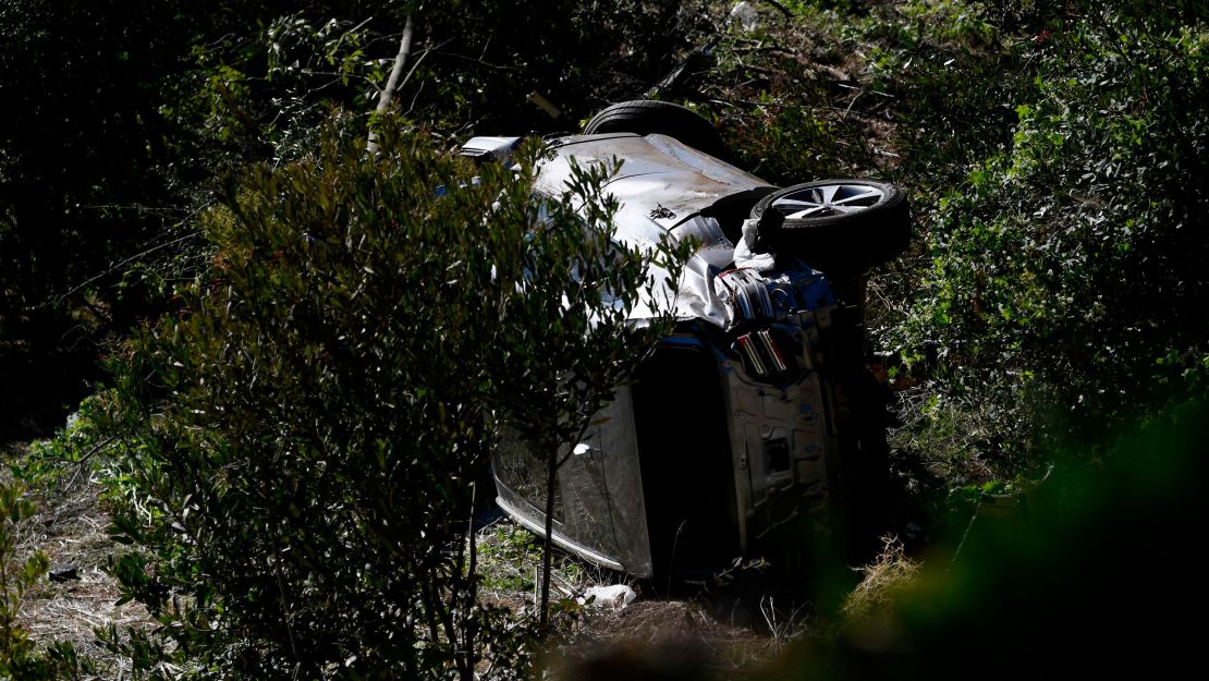 The vehicle driven by Woods lies on its side in Rancho Palos Verdes, California.