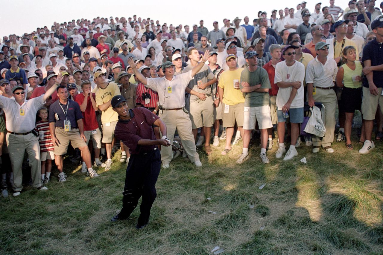 Woods chips out of the rough at the 2000 PGA Championship in Louisville, Kentucky. Throughout his career, Woods has always had the largest galleries, with thousands of people flocking from hole to hole to watch him play. He's also been credited with bringing in millions of new fans to the sport.