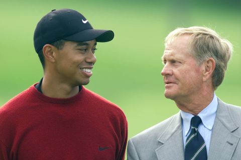 Woods chats with golf legend Jack Nicklaus at the Memorial tournament in June 2001. The two are widely considered to be the two greatest golfers in history, and only Nicklaus has won more major titles than Woods.