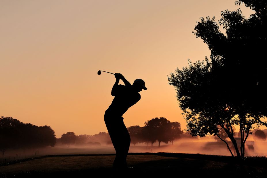 Woods hits a shot during a PGA Championship practice round in August 2009.