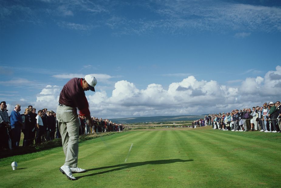 Woods hits a tee shot during the 1995 Walker Cup, an international team event.