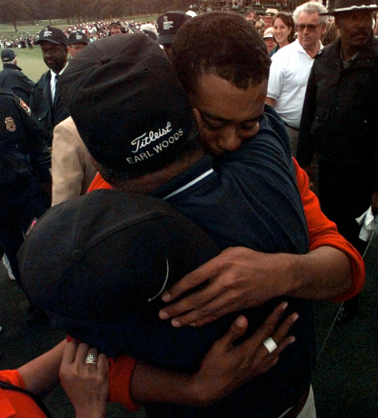 Woods hugs his father, Earl, after winning the 1997 Masters. Earl, a former Green Beret, was widely credited with developing his son's prodigious talent and pushing him to be the ultimate competitor.