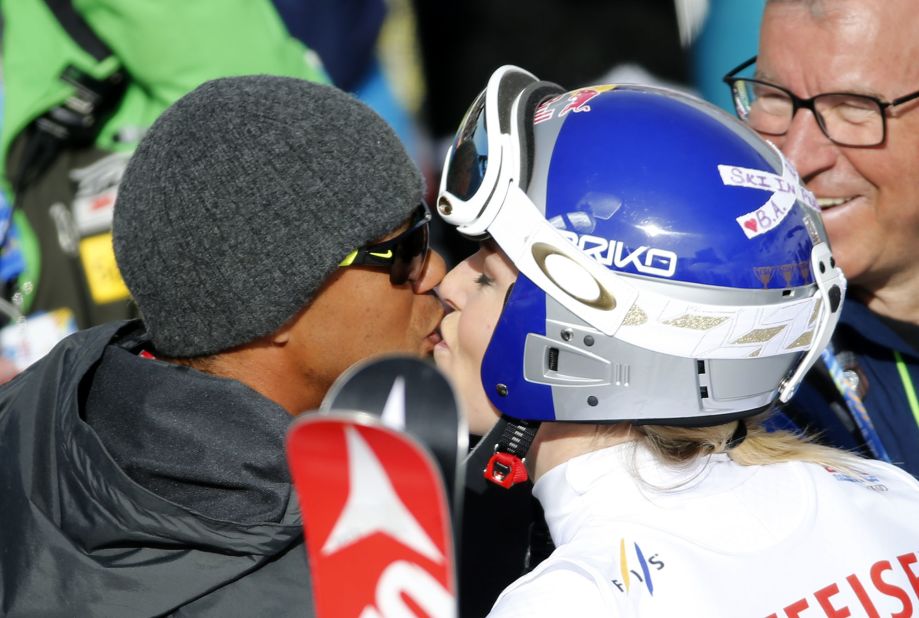Woods kisses his then-girlfriend, skiing superstar Lindsey Vonn, at an event in Beaver Creek, Colorado, in 2015. The two dated for a couple of years.