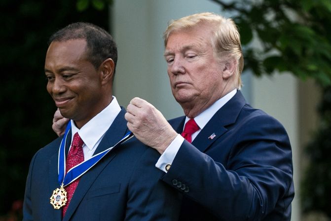 President Donald Trump presents Woods with the Presidential Medal of Freedom, the nation's highest civilian honor, in May 2019. It was just a month after Woods won his fifth Masters and 15th major. <a href="index.php?page=&url=https%3A%2F%2Fwww.cnn.com%2F2019%2F05%2F06%2Fpolitics%2Ftiger-woods-medal-of-freedom-trump%2Findex.html" target="_blank">Trump hailed Woods</a> as a "global symbol of American excellence" and congratulated him on his "amazing comeback."