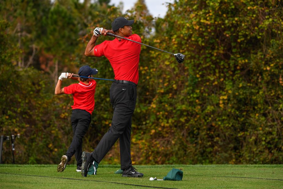 Woods and his son, Charlie, warm up before the final round of the PNC Championship in December 2020. Videos of Charlie's impressive swing, a swing that looks much like his father's, <a href=