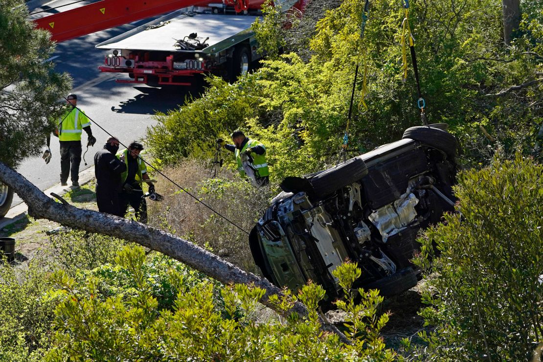 A vehicle rests on its side after a rollover accident involving golfer Tiger Woods Tuesday.