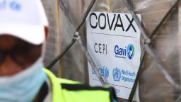 This photograph taken on February 24, 2021 shows a Covax tag on a shipment of Covid-19 vaccines from the Covax global Covid-19 vaccination programme, at the Kotoka International Airport in Accra. -