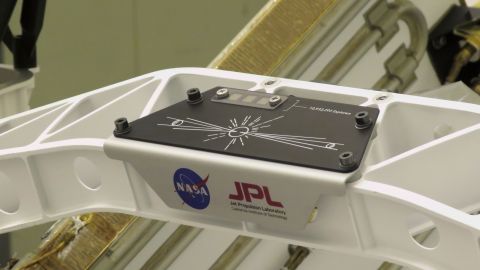 A placard commemorating NASA's "Send Your Name to Mars" campaign is on the rover.