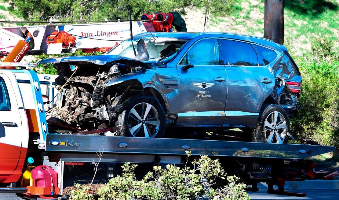 A tow truck recovers the vehicle driven by golfer Tiger Woods in Rancho Palos Verdes, California,  after a rollover accident..