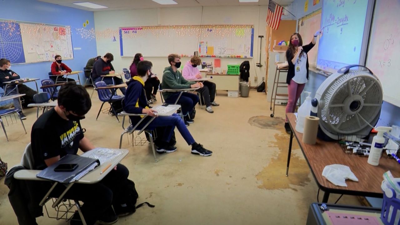 Everyone wears masks and desks are spaced at the high school, where full in-person teaching has been offered since the school year began.