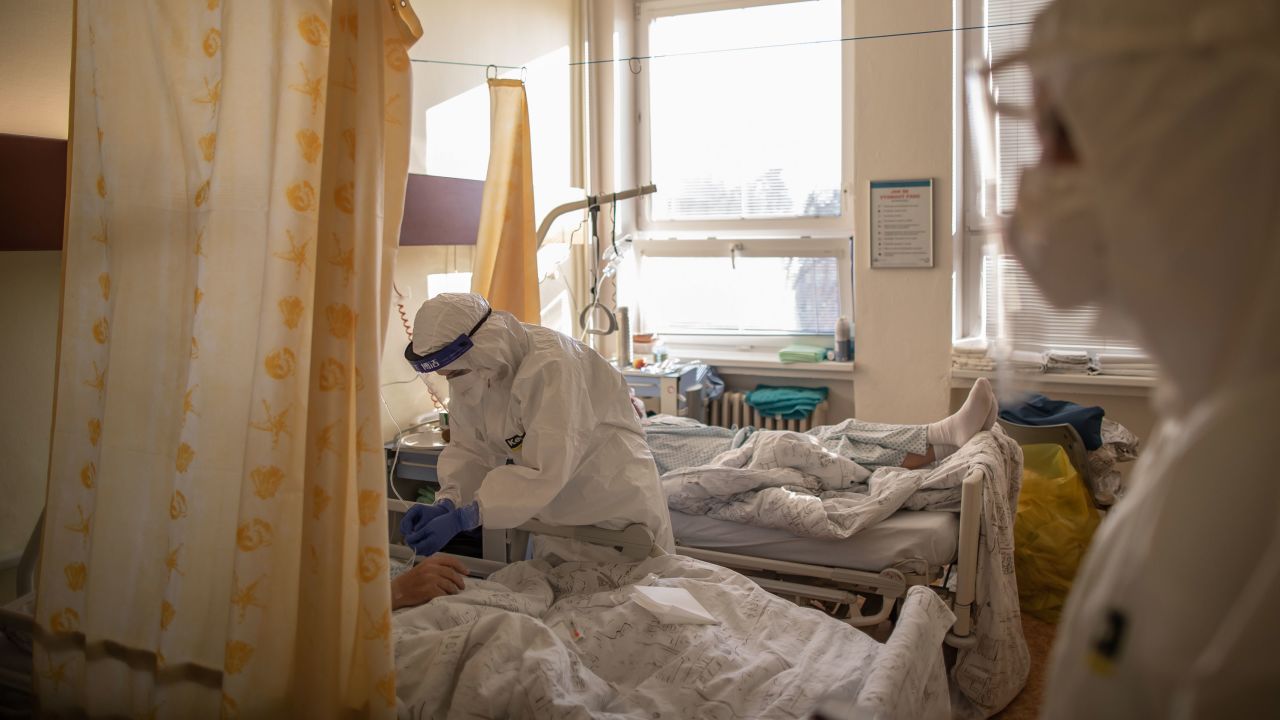 A health care worker takes care of a patient in the Covid-19 ward at Hospital Karvina-Raj on January 11, 2021 in Karvina, Czech Republic.