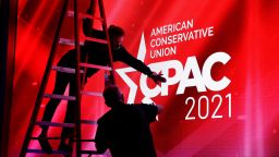 Technicians work on the stage before the start of the Conservative Political Action Conference (CPAC) in Orlando, Florida