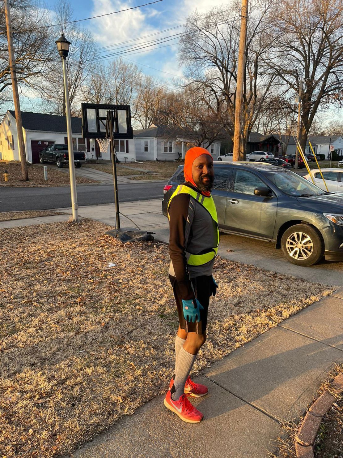 Avid runner Roy Oduor wears bright running gear to avoid getting mistaken for a criminal while running in Lenexa, Kansas.