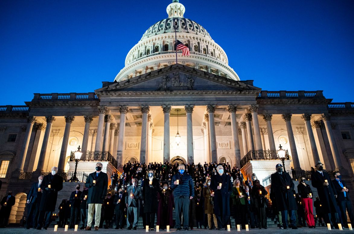 Members of Congress observe a moment of silence on the steps of the US Capitol on Tuesday, February 23. <a href="https://www.cnn.com/interactive/2021/health/covid19-us-deaths-memorial/" target="_blank">More than 500,000 Americans</a> have now lost their lives to Covid-19.