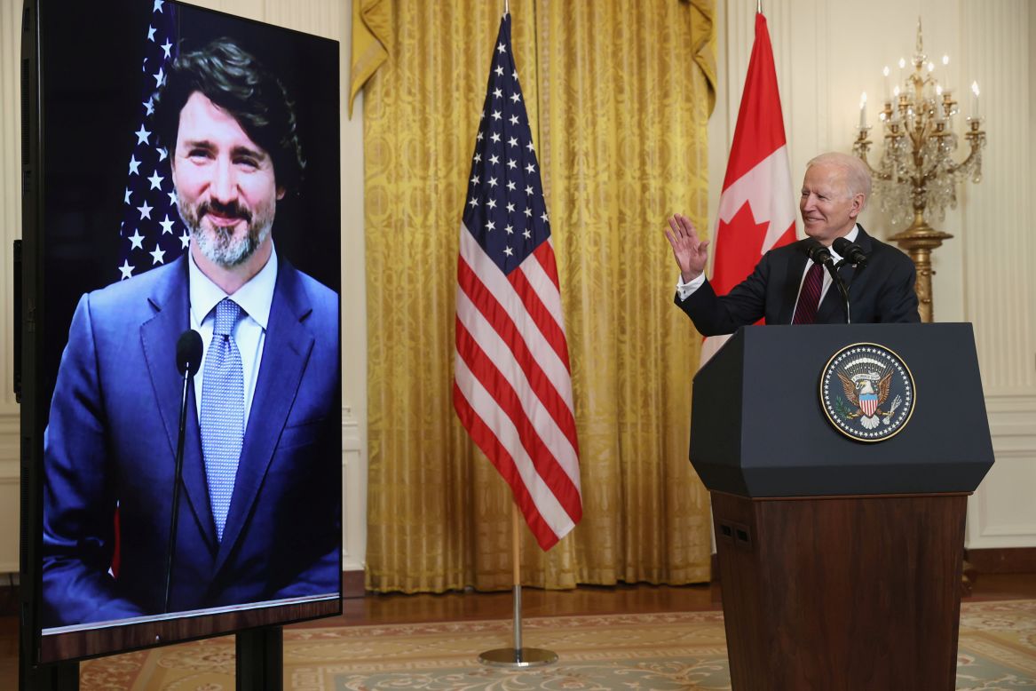 US President Joe Biden gestures to Canadian Prime Minister Justin Trudeau at the end of their <a href="https://www.cnn.com/2021/02/23/politics/biden-trudeau-white-house-visit/index.html" target="_blank">virtual bilateral meeting</a> on Tuesday, February 23. Because of the coronavirus, visits from foreign leaders are still off-limits at the White House.