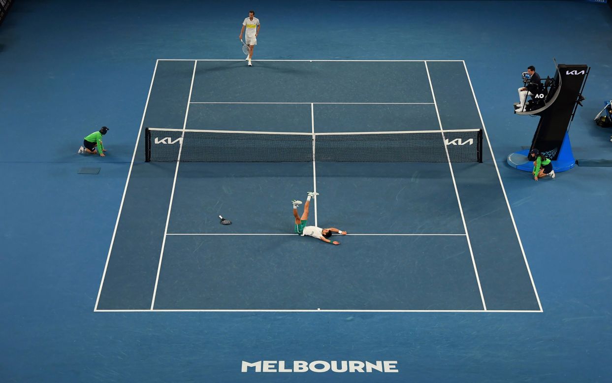 Novak Djokovic falls as he celebrates his Australian Open championship on Sunday, February 21. <a href="https://www.cnn.com/2021/02/21/tennis/australian-open-final-novak-djokovic-daniil-medvedev-spt-intl/index.html" target="_blank">Djokovic defeated Daniil Medvedev in straight sets</a> to clinch his ninth Australian Open title and his 18th grand slam. He is now two behind the all-time record of 20 held by Roger Federer and Rafael Nadal.