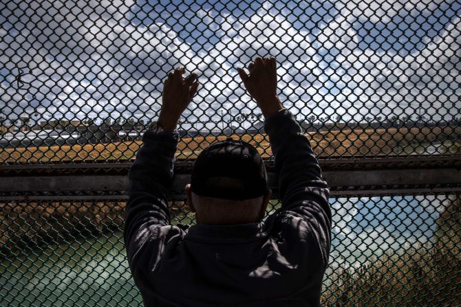 A man looks upon the Rio Grande while waiting to show his immigration documents to US immigration officers in Matamoros, Mexico, on Tuesday, February 23. <a href="https://www.cnn.com/2021/02/24/politics/immigration-mexico-tent-camp/index.html" target="_blank">A tent camp in Matamoros,</a> where hundreds of migrants stayed in deplorable conditions after being subject to a Trump-era policy requiring they stay in Mexico until their immigration court date in the United States, is being drawn down, the Department of Homeland Security announced on Wednesday.