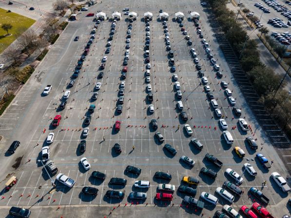 Cars line up for Covid-19 vaccines outside Houston's NRG Park on Wednesday, February 24.