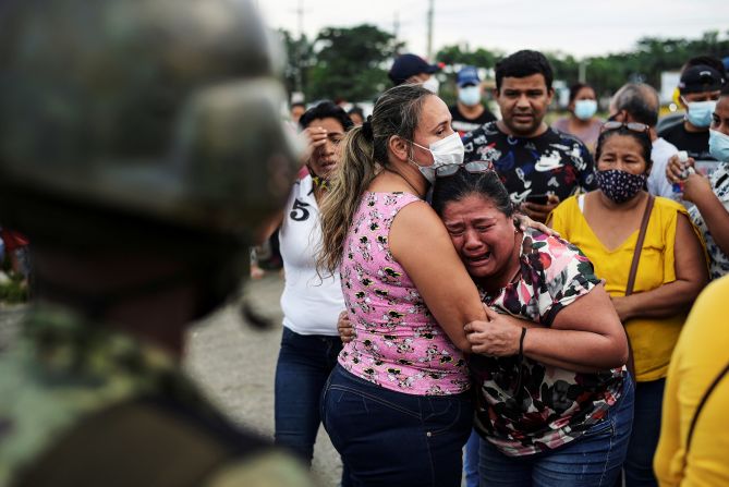 A woman reacts outside a Guayaquil, Ecuador, prison where <a href="https://www.cnn.com/videos/world/2021/02/25/ecuador-prison-riot-jba-lon-orig.cnn" target="_blank">inmates were killed during a riot</a> on Tuesday, February 23.