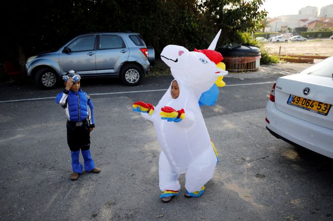 Boys in Ashkelon, Israel, wear costumes Wednesday, February 24, to mark the upcoming Jewish holiday of Purim.