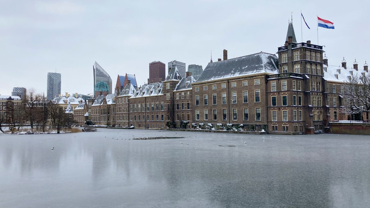 The frozen Hofvijver pond is seen outside the Dutch parliament buildings in The Hague, Netherlands, Tuesday, February 9.