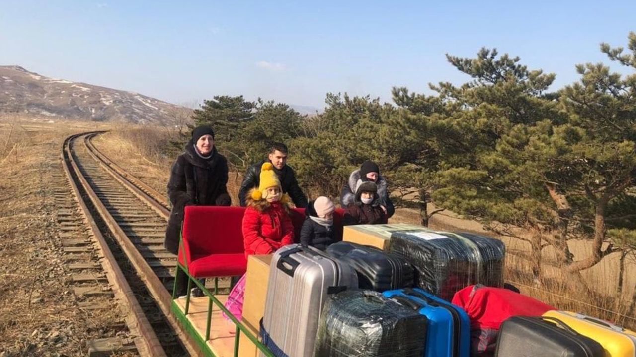 Russian diplomats working in the Pyongyang embassy had to use a handcar as they returned home from North Korea with their family members.
